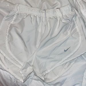 White Nike shorts